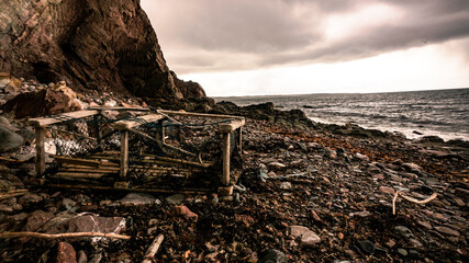 A washed up lobster cage on the shore in the east coast of Canada.