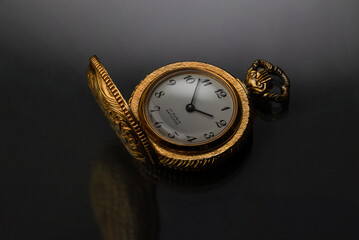 Mechanical golden pocket watch (switzerland)