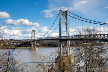 Poughkeepsie, NY - USA -Dec. 29, 2020: The Franklin Delano Roosevelt Mid-Hudson Bridge is a toll suspension bridge across the Hudson River between Poughkeepsie and Highland in the state of New York.