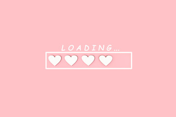 Loading from symbols of hearts on a pink background. Valentine's day concept.