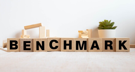 Benchmark word written on wood block