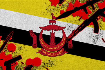 Brunei Darussalam flag and various weapons in red blood. Concept for terror attack and military...