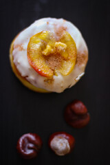 Delicious Donuts with apple and cinnamon on a black background