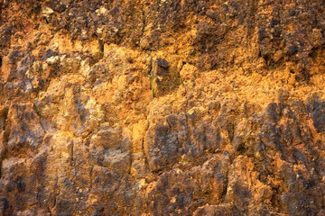 Natural yellow stone background with texture