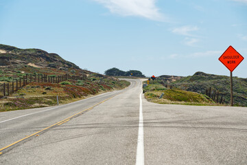 A Shoulder Work sign on the road. Monterey County, California. Scenic California State route 1