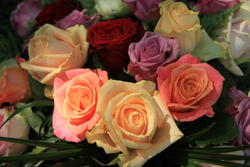 Pastel roses in bridal arrangement