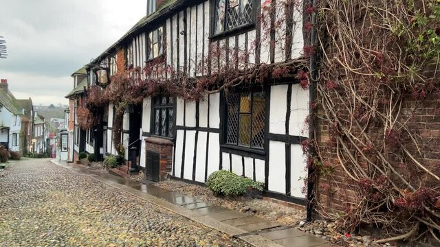 MERMAID INN HOTEL, RYE, EAST SUSSEX, ENGLAND - AUGUST 14, 2020: The medieval Mermaid Inn built in 1420 along cobble stone Mermaid Street Rye, East Sussex, UK