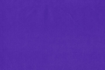 Clean purple retro paper background. Vintage violet cardboard texture. Grunge paper for drawing. Simple blank fabric pattern.