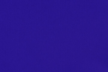Clean purple retro paper background. Vintage violet cardboard texture. Grunge paper for drawing. Simple blank fabric pattern.