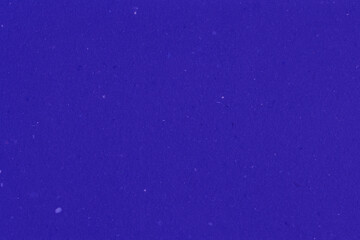 Clean purple retro paper background. Vintage violet cardboard texture. Grunge paper for drawing. Simple blank fabric pattern.