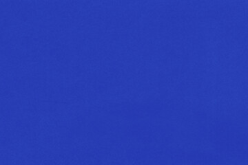 Clean purple retro paper background. Vintage violet cardboard texture. Grunge paper for drawing. Simple blank fabric pattern.