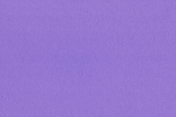 Clean purple retro paper background. Vintage violet cardboard texture. Grunge paper for drawing. Simple blank fabric pattern.