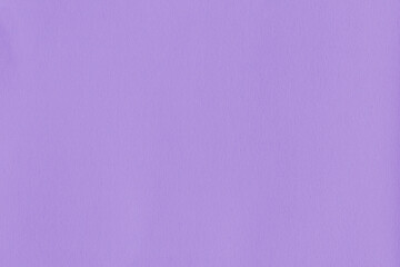 Clean purple retro paper background. Vintage violet cardboard texture. Grunge paper for drawing. Simple blank fabric pattern.