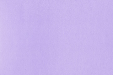 Clean purple retro paper background. Vintage violet cardboard texture. Grunge paper for drawing. Simple blank fabric pattern.