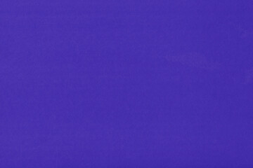 Clean purple retro paper background. Vintage violet cardboard texture. Grunge paper for drawing. Simple blank fabric pattern.