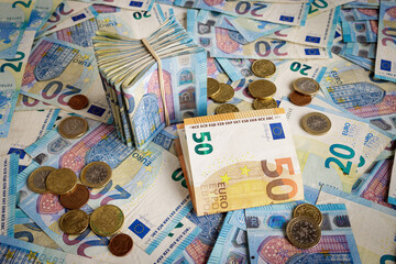 Euro money, banknotes and coins background, currency of European Union (EUR)