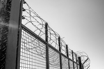 Razor wire fence at a military establishment in England