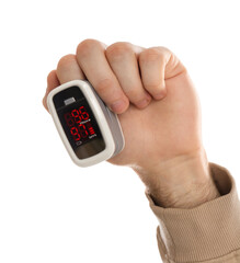 Man using pulse oximeter for oxygen level testing on white background, closeup
