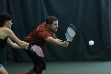 pickleball play during mixed doubles tournament