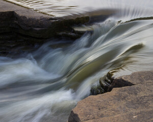 water flowing over rocks