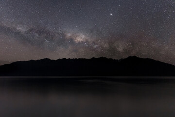 Wonderful night with milky way behind the mountains in Glenorchy, New Zealand, South Island