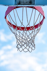 basketball hoop against blue sky