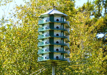 Six levels bird house in green and white colors