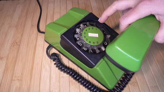 Woman Dialing Emergency Numbers 911 999 112 Using Retro Rotary Dial Telephone From 80s And 90s