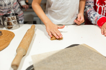 happy family funny kids are preparing the dough, bake cookies in the kitchen