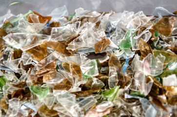 Multicolored shredded PET plastic.