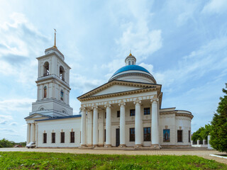 Fototapeta na wymiar Single-domed St Nicholas' Cathedral with a column façade and bell tower in Serpukhov, Russia. Travel and architecture.