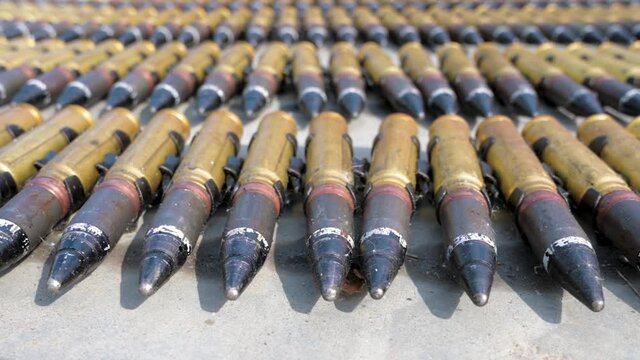 Tape of large-caliber aviation cartridges.