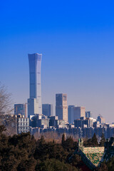 Fototapeta na wymiar Beijing cityscape between ancient chinese architecture. historic buildings and Beijing modern building with sweet sun rise sky, Beijing, China
