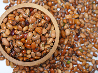 Close up shoot of 'tolo beans' or Vigna unguiculata subsp. unguiculata, one kind of beans that usually processed as food ini Indonesia, capture on white background
