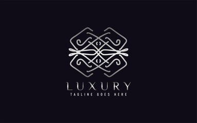 Luxury Logo Design. Elegant Symbol with Geometric Modern Lines Combination. Usable For Business, Community, Foundation, Services, Company. Vector Logo Design Illustration.