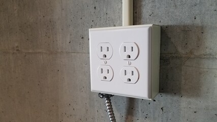 Power outlets on concrete wall