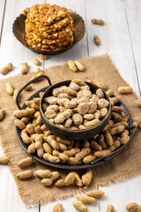 Sesame seed cake or candy, peanuts chikki with roasted peanuts for the celebration of Indian festival Lohri