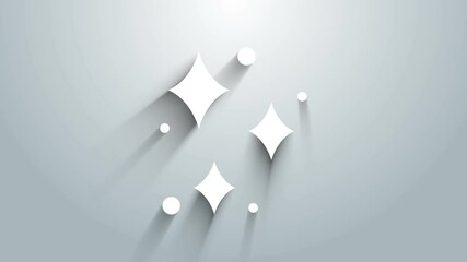 White Sparkle stars with magical glitter particles icon isolated on grey background. Magic christmas decoration. 4K Video motion graphic animation - Powered by Adobe