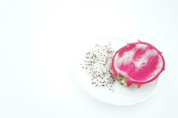 Fresh white dragon fruit on white background