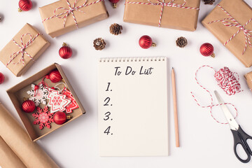 Top above overhead close up view photo of empty blank copybook and accessories for wrapping making presents and notepad with to do list  on table desk