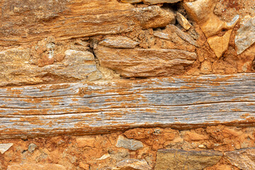 Detail from old wooden and stone house in a village