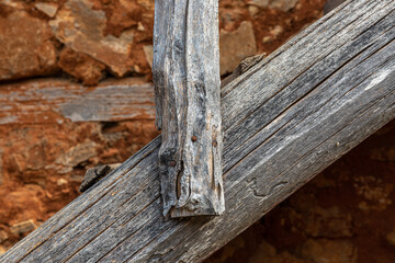 Detail from old wooden and stone house in a village