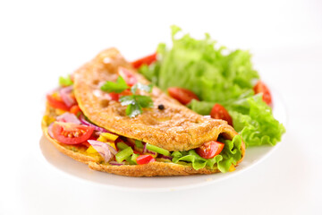 omelette with lettuce salad in plate