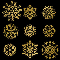 Gold snowflakes set on black background. Vector illustration.