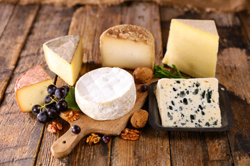 assorted of dairy product on wood background
