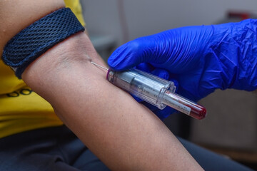 sample blood collection using venipuncture injection for new covid strain in India