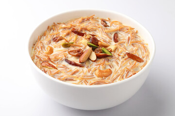 Khir or kheer payasam also known as Sheer Khurma Seviyan consumed especially on Eid or any other festival in india/asia. Served with dry fruits toppings in a ceramic bowl
