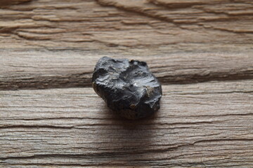 Deformated lead slug bullet after punching wood