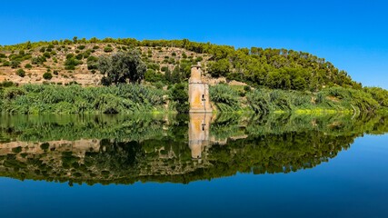 reflection in the water, river Ebro in Spain Catalunia