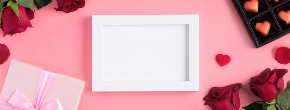 Valentine's Day memory with picture frame concept on pink background